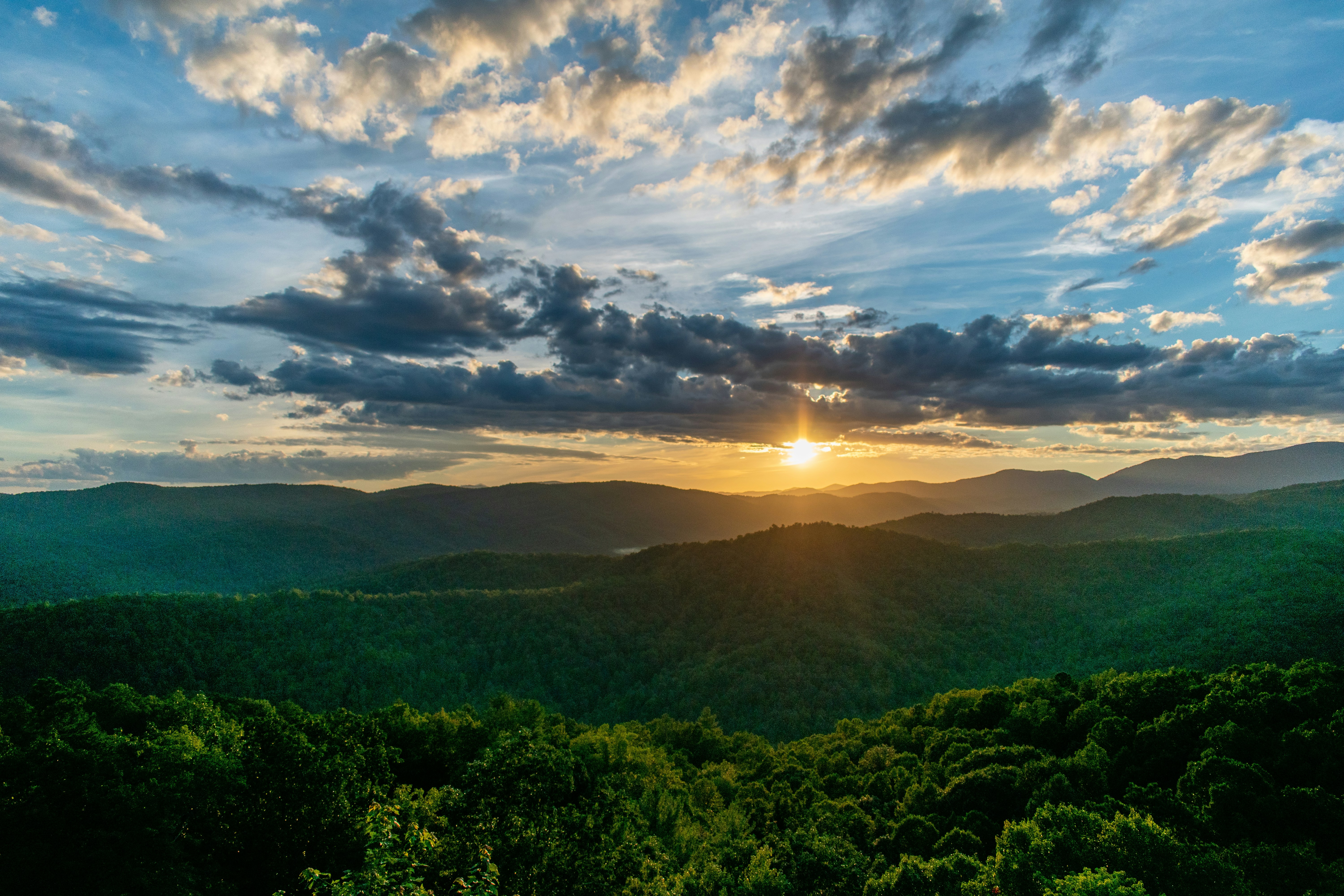 Sunset over mountains in Macon County